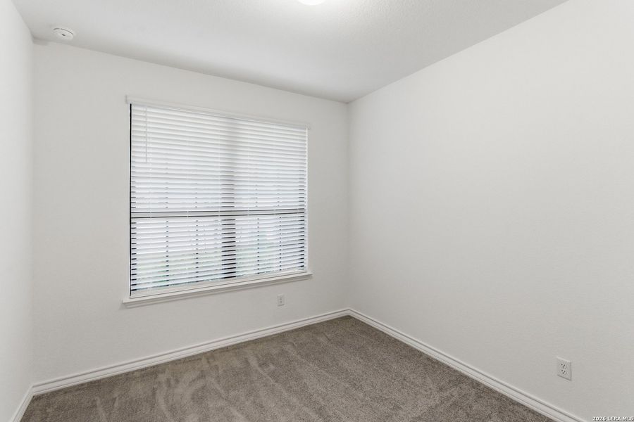 Spacious, unfurnished interior of a new home in Lily Springs, Seguin (Image 31).
