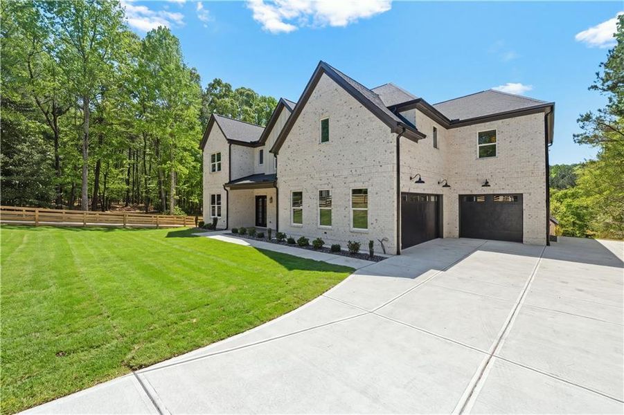 Front exterior of a new home in , Lawrenceville, GA, highlighting curb appeal (Image 27).