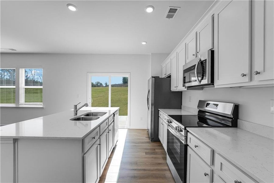 Furnished interior view inside a new home in Crossvine Village, LaGrange (Image 3).