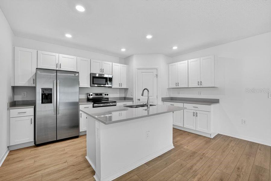 Furnished interior view inside a new home in Palm Wind, Hudson (Image 10).