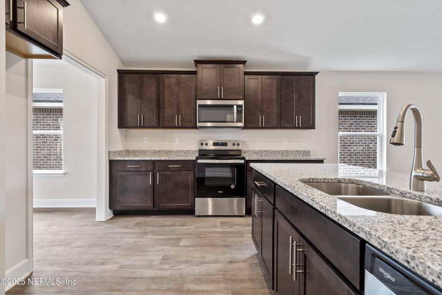 Furnished interior view inside a new home in Shadow Crest at Rolling Hills, Green Cove Springs (Image 10).