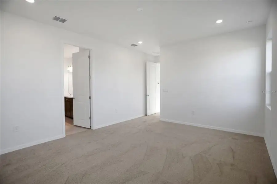 Spacious, unfurnished interior of a new home in Turnleaf, Punta Gorda (Image 25). Spacious, unfurnished interior of a new home in Turnleaf, Punta Gorda (Image 25).