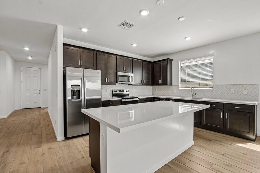 Kitchen featuring the Roosevelt Collection. Not actual home, finishes may vary by community.
