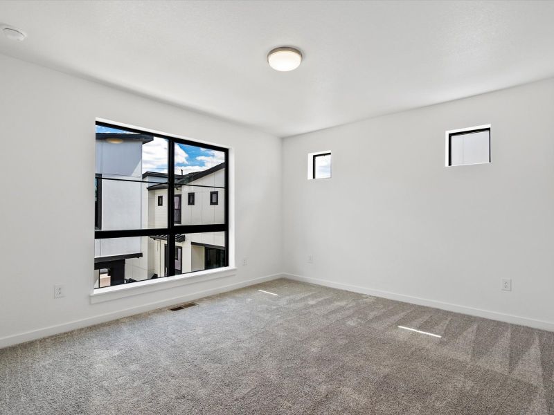 Spacious, unfurnished interior of a new home in The Commons at Victory Ridge, Colorado Springs (Image 6).