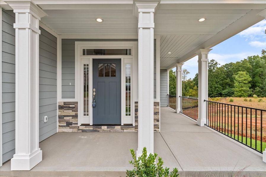 Representative exterior details of a home built from the Emilia Elite by Enchanted Homes in Pointe Summit, Slater-Marietta (Image 28).