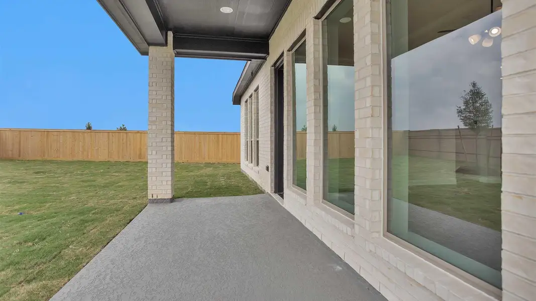 Exterior details and patio area of a home in Bridgeland, Cypress (Image 3).