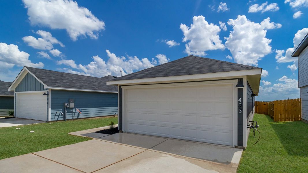 Representative exterior photo of a completed home built from the The Estero by D.R. Horton in Prairie Lakes, Buda, TX (Image 12). Representative exterior photo of a completed home built from the The Estero by D.R. Horton in Prairie Lakes, Buda, TX (Image 12).