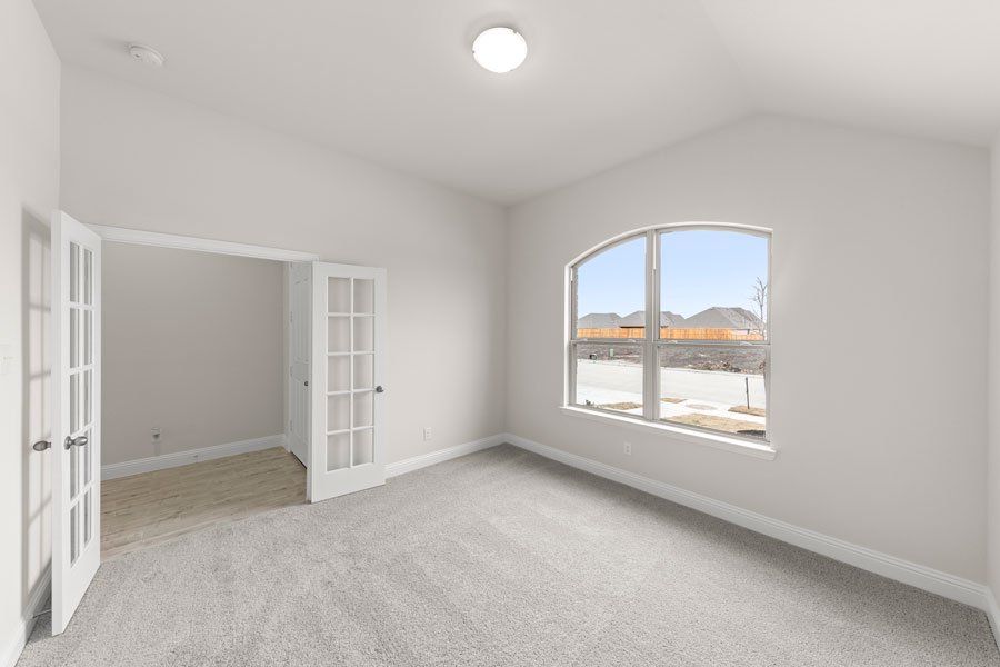 Representative exterior photo of a completed home built from the Kingston by Impression Homes in Timberbrook, Justin, TX (Image 22).