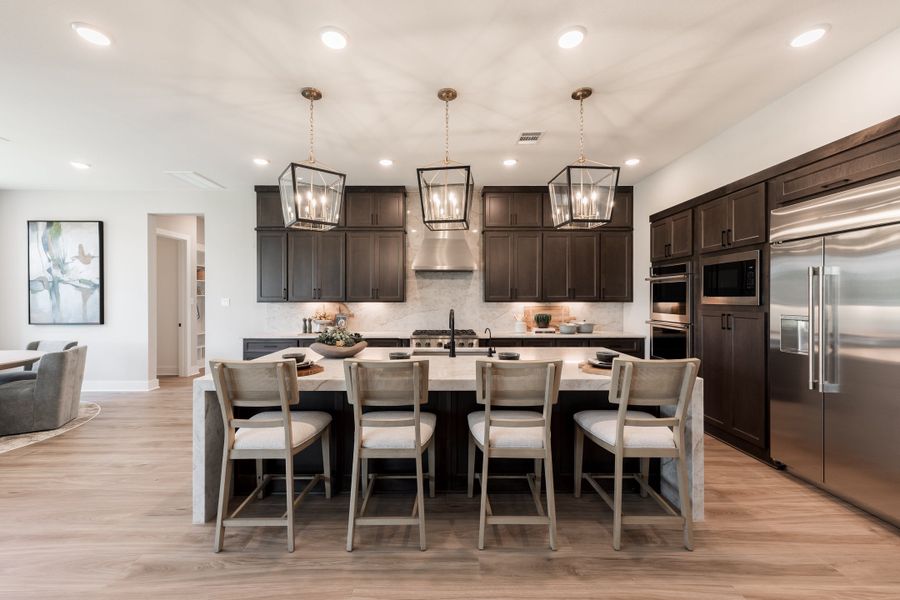 Representative furnished interior of a home built from the Camden by Tri Pointe Homes in Bridgeland, Cypress (Image 11).