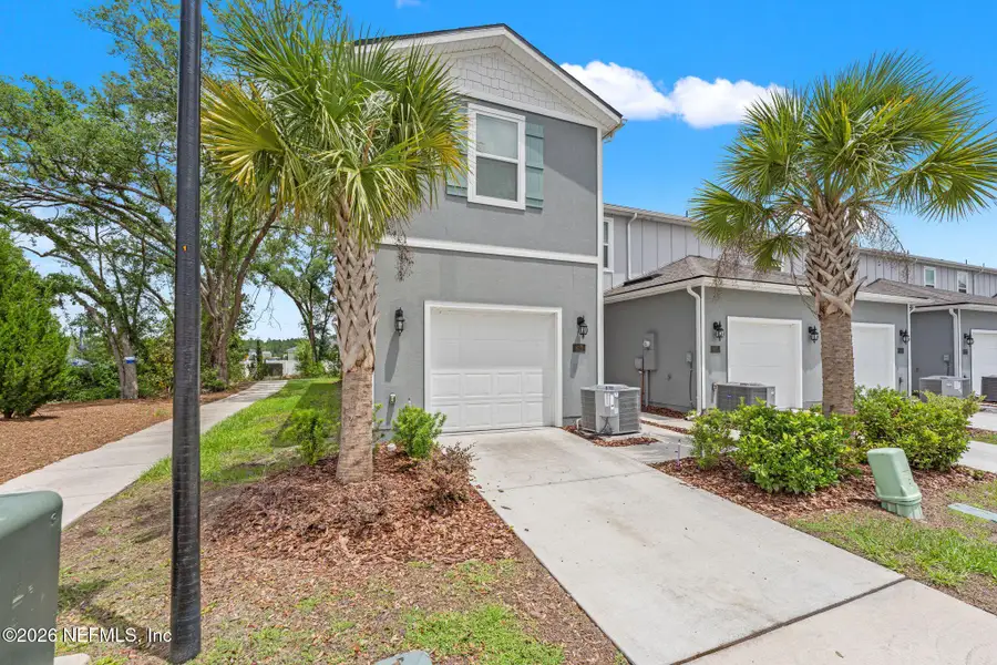 Front exterior of a new home in , Middleburg, FL, highlighting curb appeal (Image 19).
