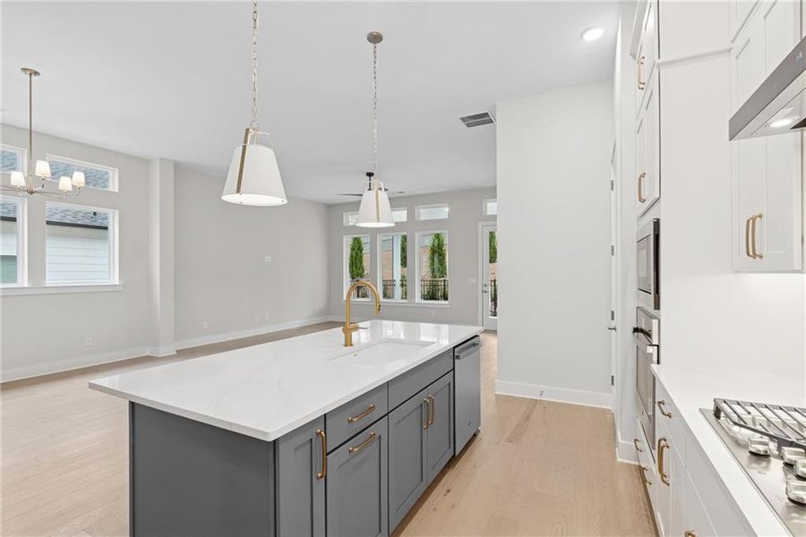 Furnished interior view inside a new home in Maple Grove at Towne Lake, Woodstock (Image 7).