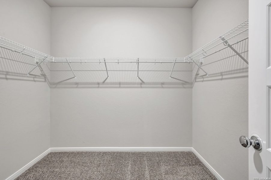 Spacious, unfurnished interior of a new home in Hunters Ranch, San Antonio (Image 52).