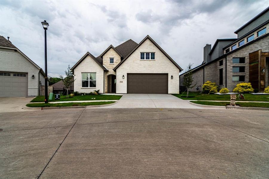 Front exterior of a new home in , Heath, TX, highlighting curb appeal (Image 23).