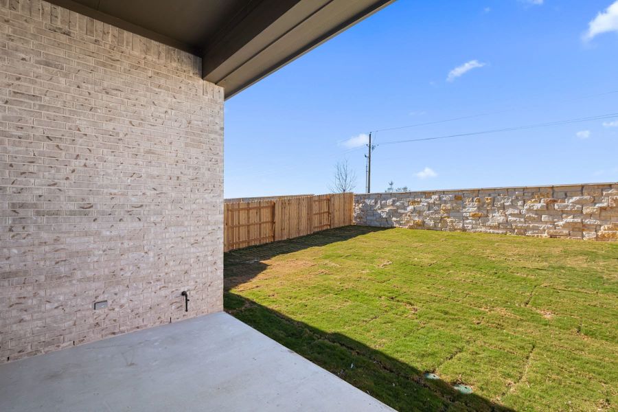 Exterior details and patio area of a home in Flora, Hutto (Image 28).