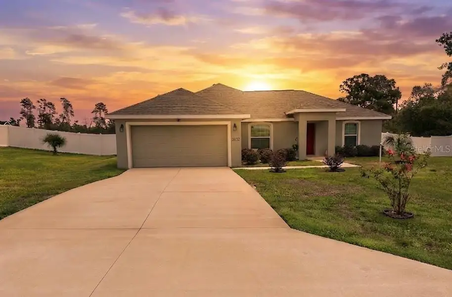 Front exterior of a new home in , Ocala, FL, highlighting curb appeal (Image 1). Front exterior of a new home in , Ocala, FL, highlighting curb appeal (Image 1).