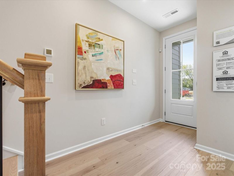 Front Entry Through 8' Doorway. *Model Photos | Actual Finishes, Structural Selections, and Orientation May Vary.