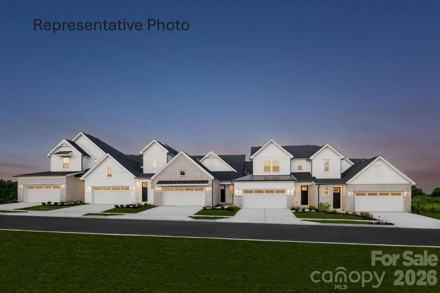 Front exterior of a new home in , Fort Mill, SC, highlighting curb appeal (Image 1). Front exterior of a new home in , Fort Mill, SC, highlighting curb appeal (Image 1).