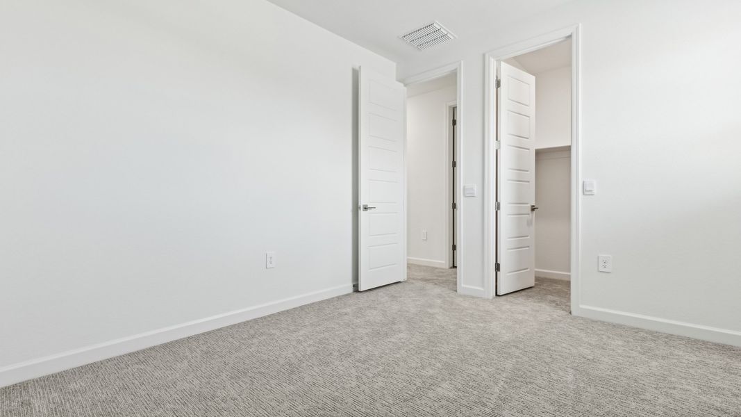 Representative unfurnished interior of a home built from the Phoenician by D.R. Horton in The Ridge at Stone Butte, Phoenix (Image 43). Representative unfurnished interior of a home built from the Phoenician by D.R. Horton in The Ridge at Stone Butte, Phoenix (Image 43).