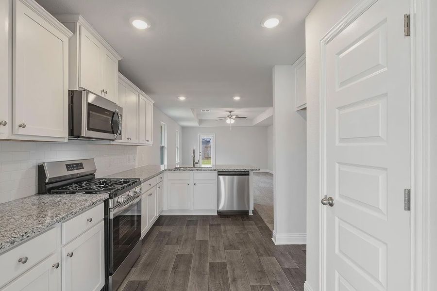 Furnished interior view inside a new home in Grand Oaks Reserve, Cleveland (Image 5).