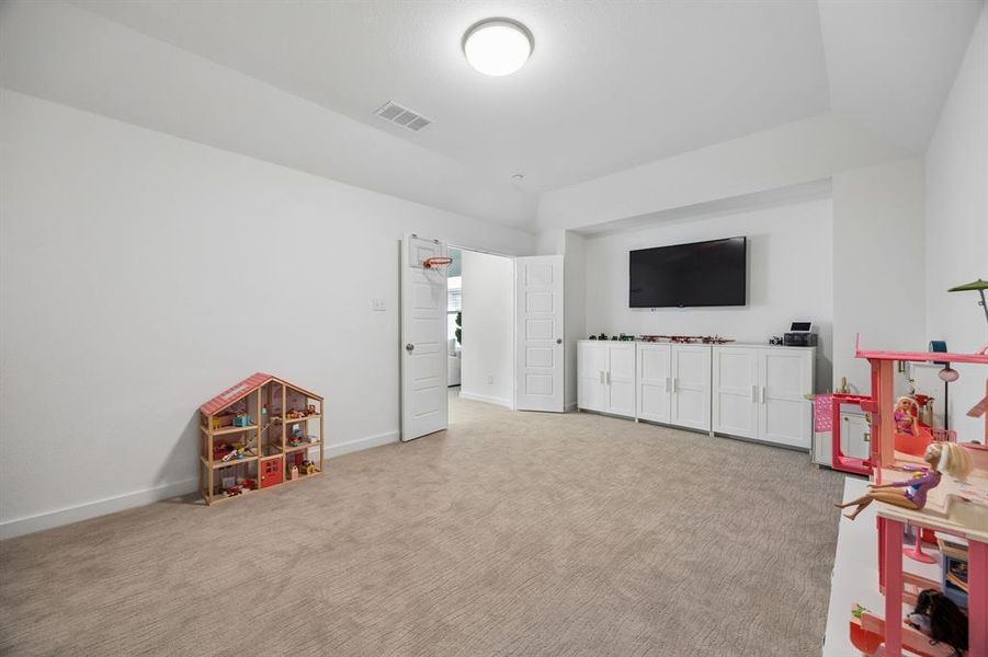 play room or theater play room or theater