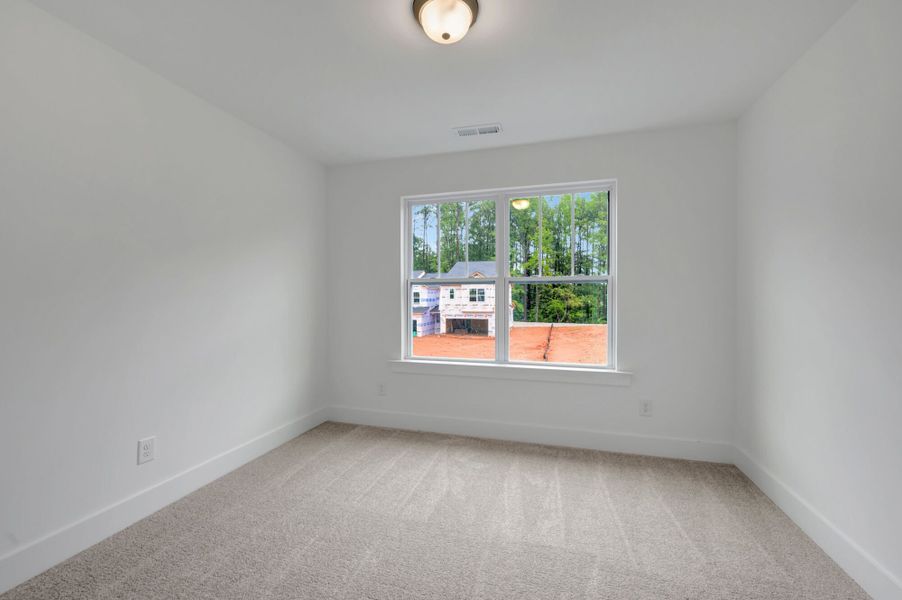Spacious, unfurnished interior of a new home in Ashmore Townes, Garner (Image 30). Spacious, unfurnished interior of a new home in Ashmore Townes, Garner (Image 30).