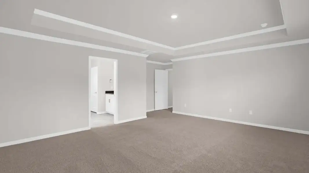 Spacious, unfurnished interior of a new home in The Estates Park, Apex (Image 33).