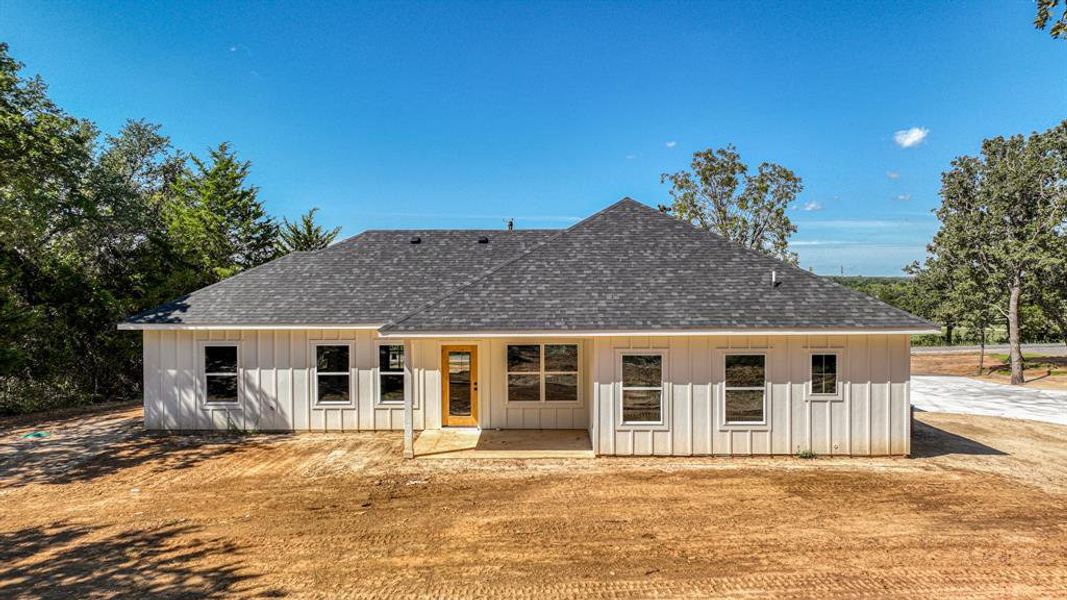 Exterior details and patio area of a home in Parallel Pastures, Poolville (Image 3).