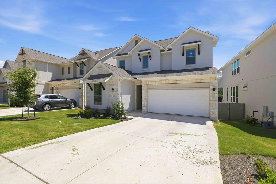 Front exterior of a new home in , Georgetown, TX, highlighting curb appeal (Image 26). Front exterior of a new home in , Georgetown, TX, highlighting curb appeal (Image 26).