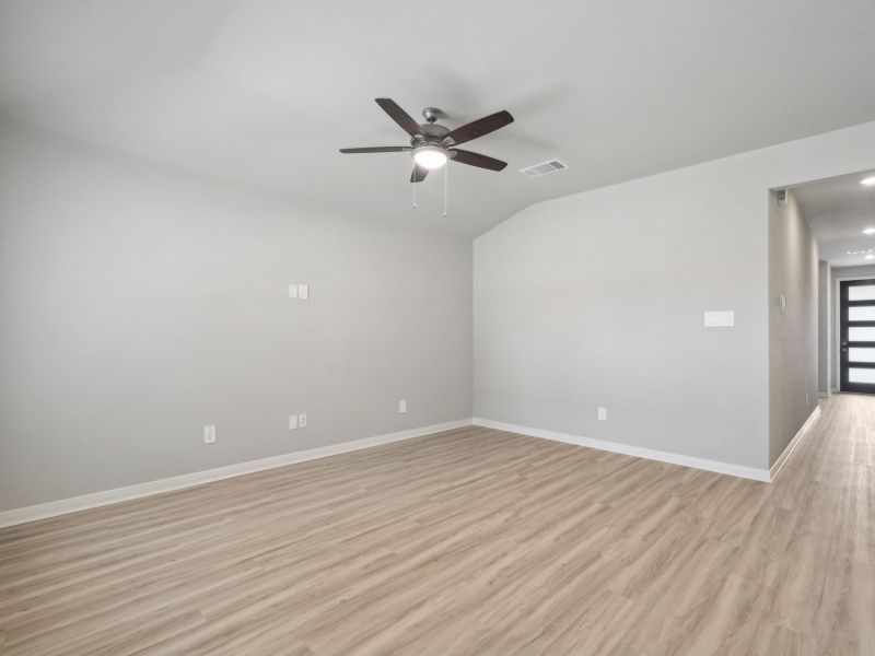 Living room in the Briscoe floorplan at a Meritage Homes community. Living room in the Briscoe floorplan at a Meritage Homes community.