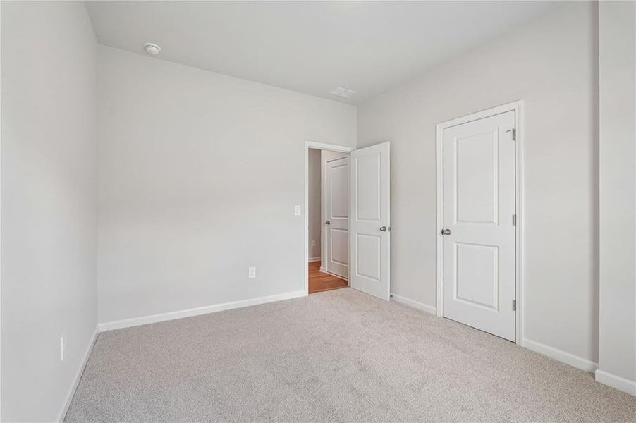 Spacious, unfurnished interior of a new home in Northwoods at Mirror Lake, Villa Rica (Image 52).