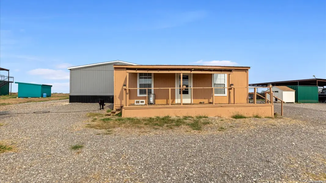 Exterior details and patio area of a home in , Jourdanton (Image 20).