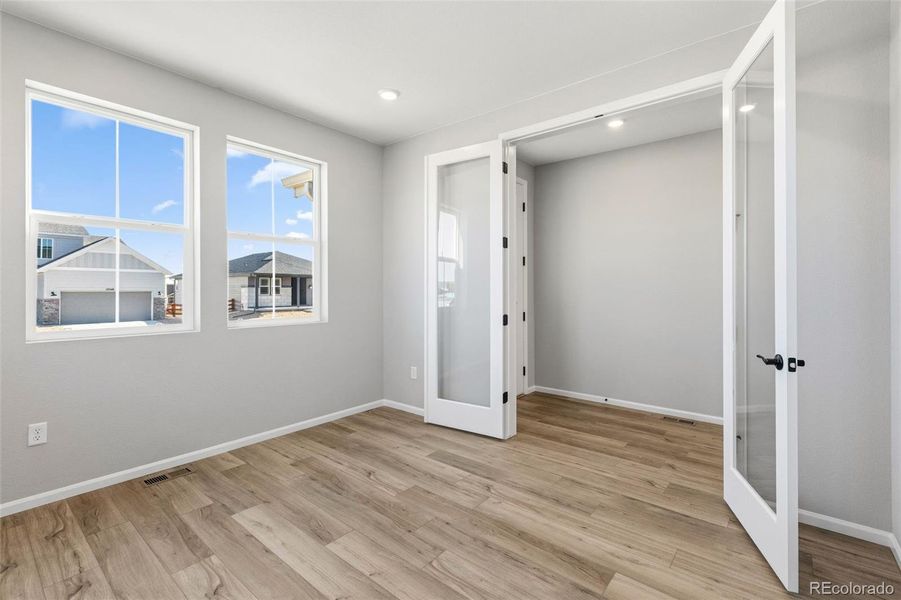 Spacious, unfurnished interior of a new home in The Estates Collection at Talon Pointe, Thornton (Image 17).