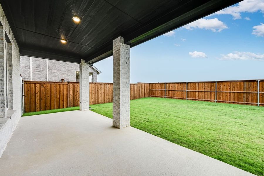 Exterior details and patio area of a home in Cross Creek Meadows 55s, Celina (Image 2).