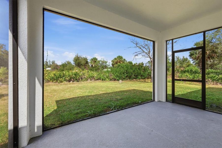 Exterior details and patio area of a home in , North Port (Image 27).