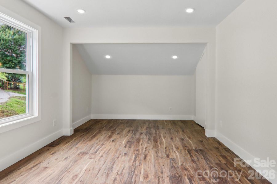 Spacious, unfurnished interior of a new home in , Waynesville (Image 32).