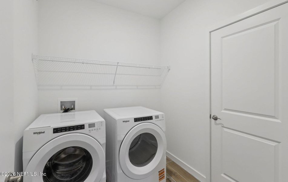 Furnished interior view inside a new home in Colbert Landings, Palm Coast (Image 9).
