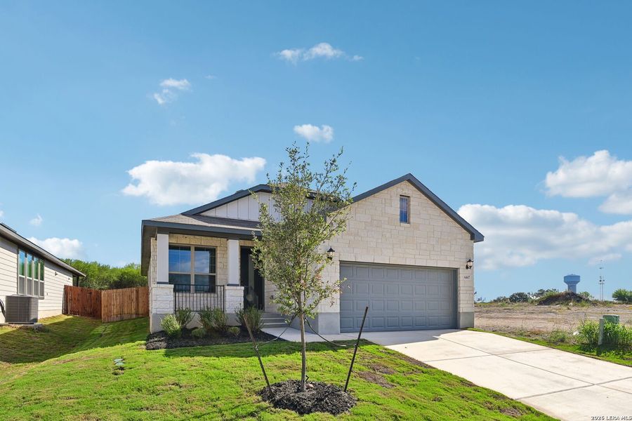 Front exterior of a new home in Royal Crest, San Antonio, TX, highlighting curb appeal (Image 25).