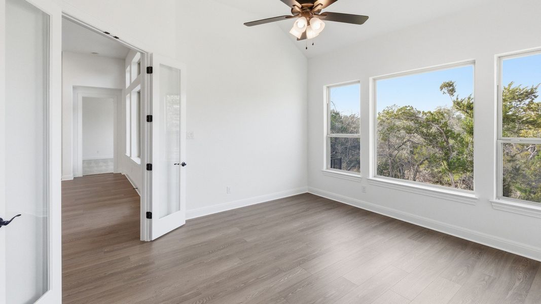 Furnished interior view inside a new home in Oaks at San Gabriel, Georgetown (Image 6).
