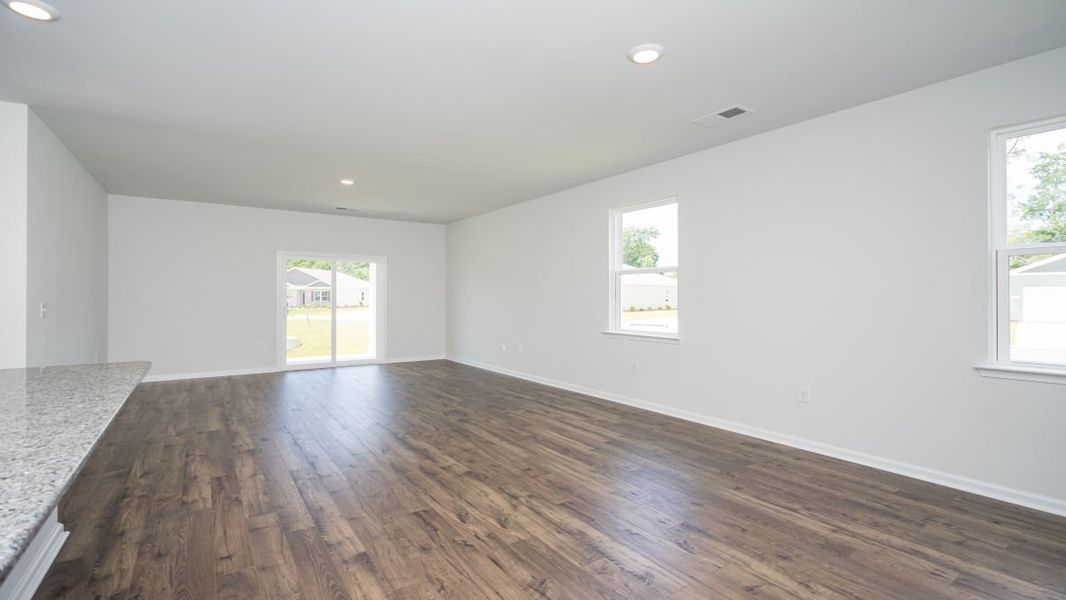 Representative unfurnished interior of a home built from the ROBIE by D.R. Horton in Indigo Preserve, Leland (Image 11).