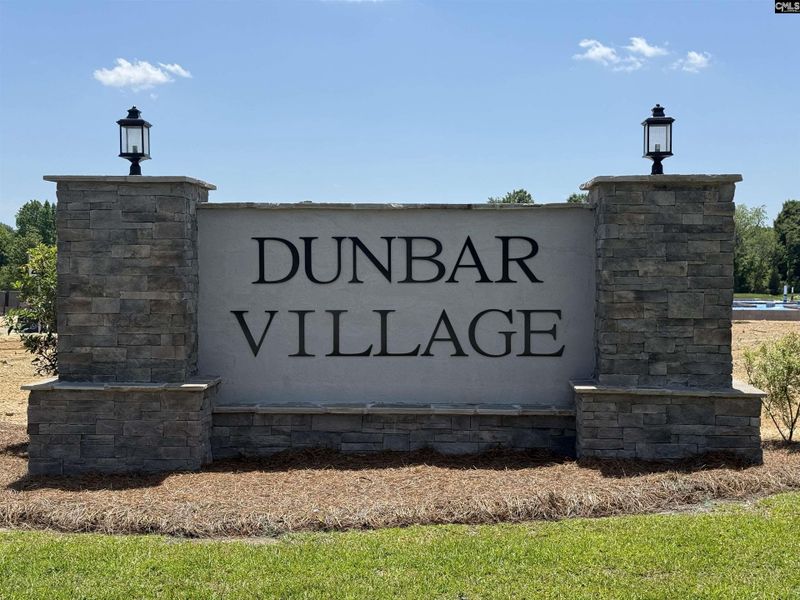 Front exterior of a new home in Dunbar Village, Cayce, SC, highlighting curb appeal (Image 1).
