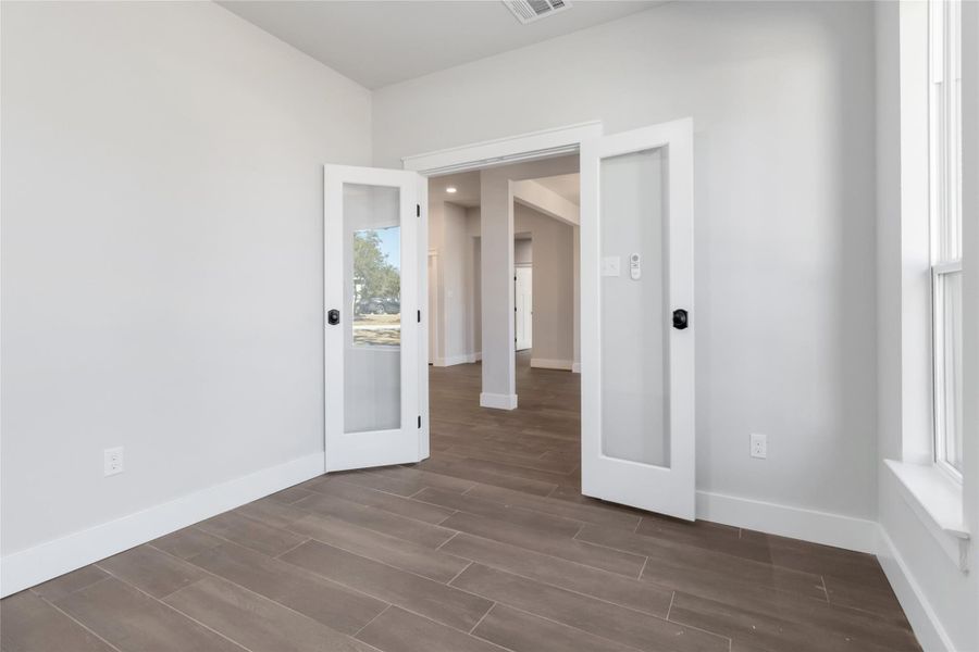 Dedicated office with glass french doors