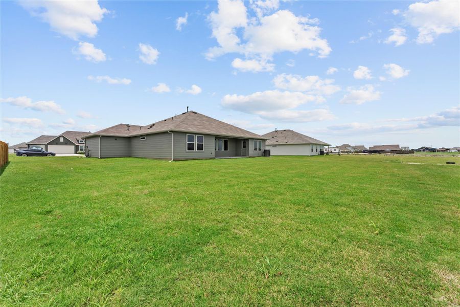 Exterior details and patio area of a home in Hartland Ranch, Lockhart (Image 4).