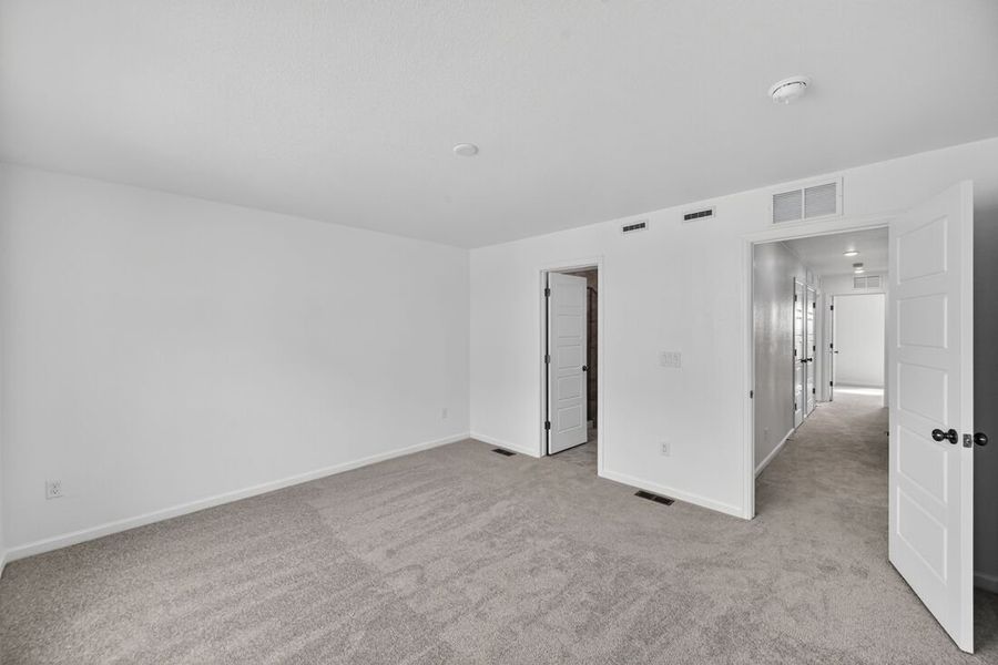 Spacious, unfurnished interior of a new home in Trailstone, Arvada (Image 12).