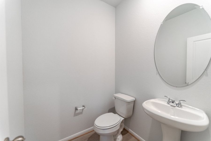 Furnished interior view inside a new home in Caney Mills, Conroe (Image 11).