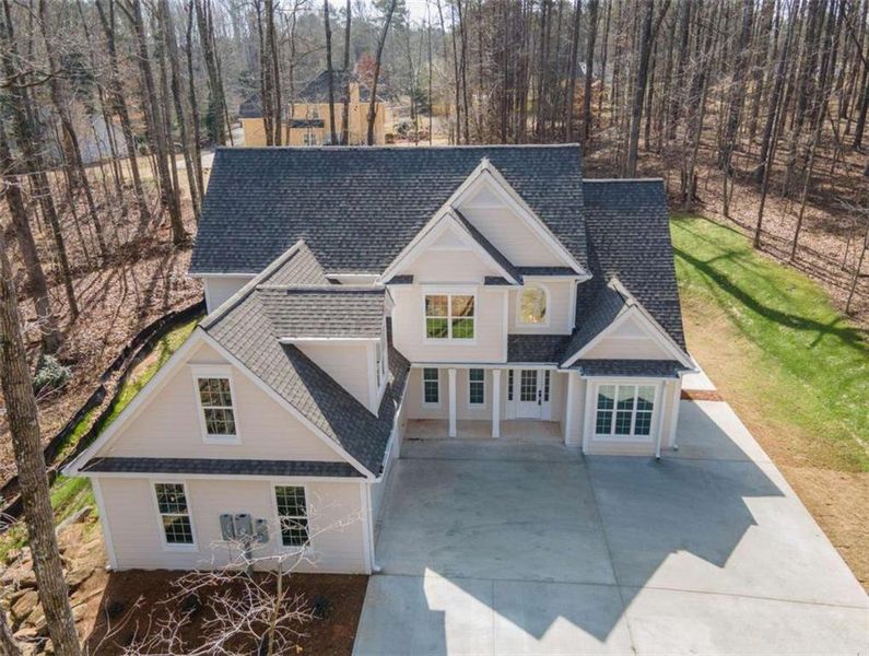 Front exterior of a new home in , Jonesboro, GA, highlighting curb appeal (Image 32).