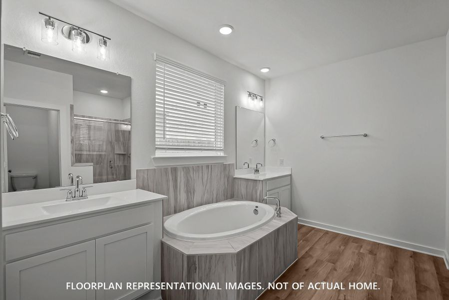 Furnished interior view inside a new home in The Oaks on 6th Street, Magnolia (Image 7).