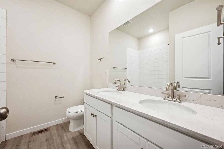 Furnished interior view inside a new home in The Aurora Highlands, Aurora (Image 6).
