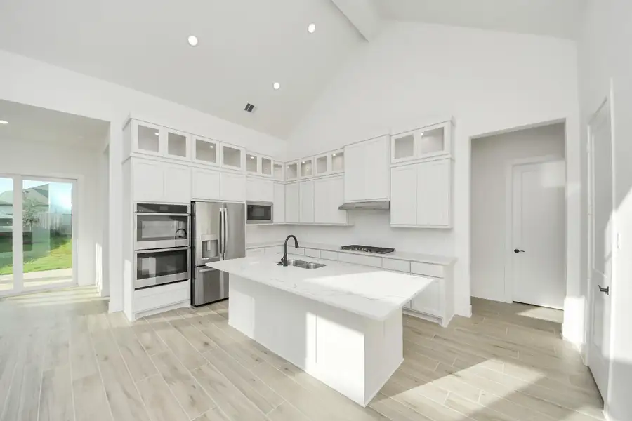 Furnished interior view inside a new home in Meridiana, Manvel (Image 6).