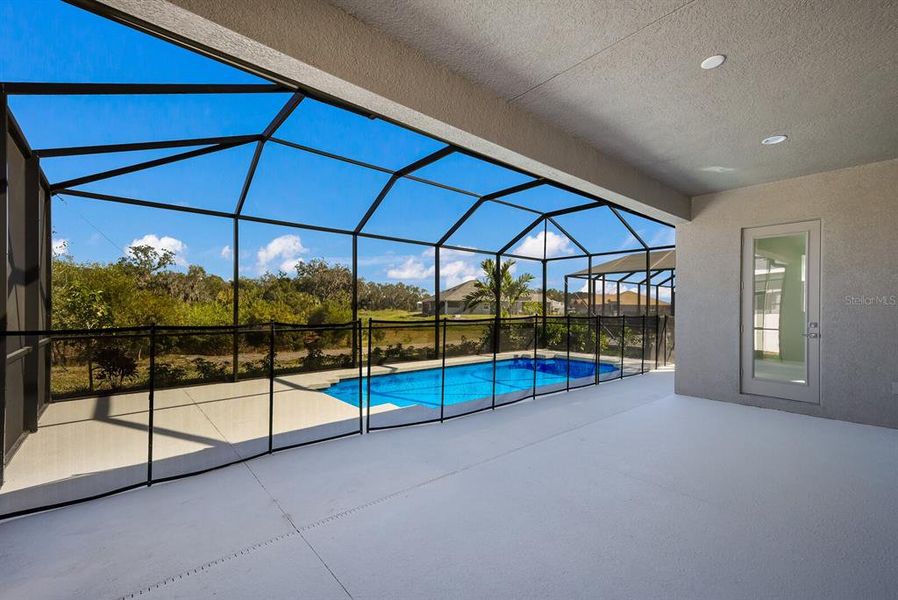 Exterior details and patio area of a home in The Willows, Parrish (Image 4).