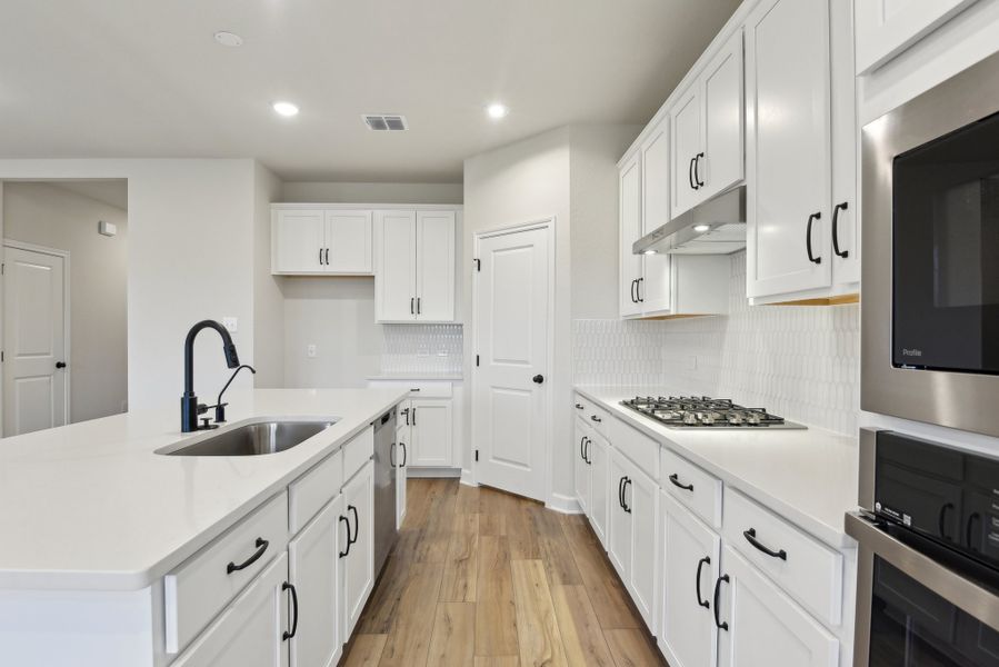 Representative furnished interior of a home built from the Makenzie by Ashton Woods in Hennersby Hollow, San Antonio (Image 7).
